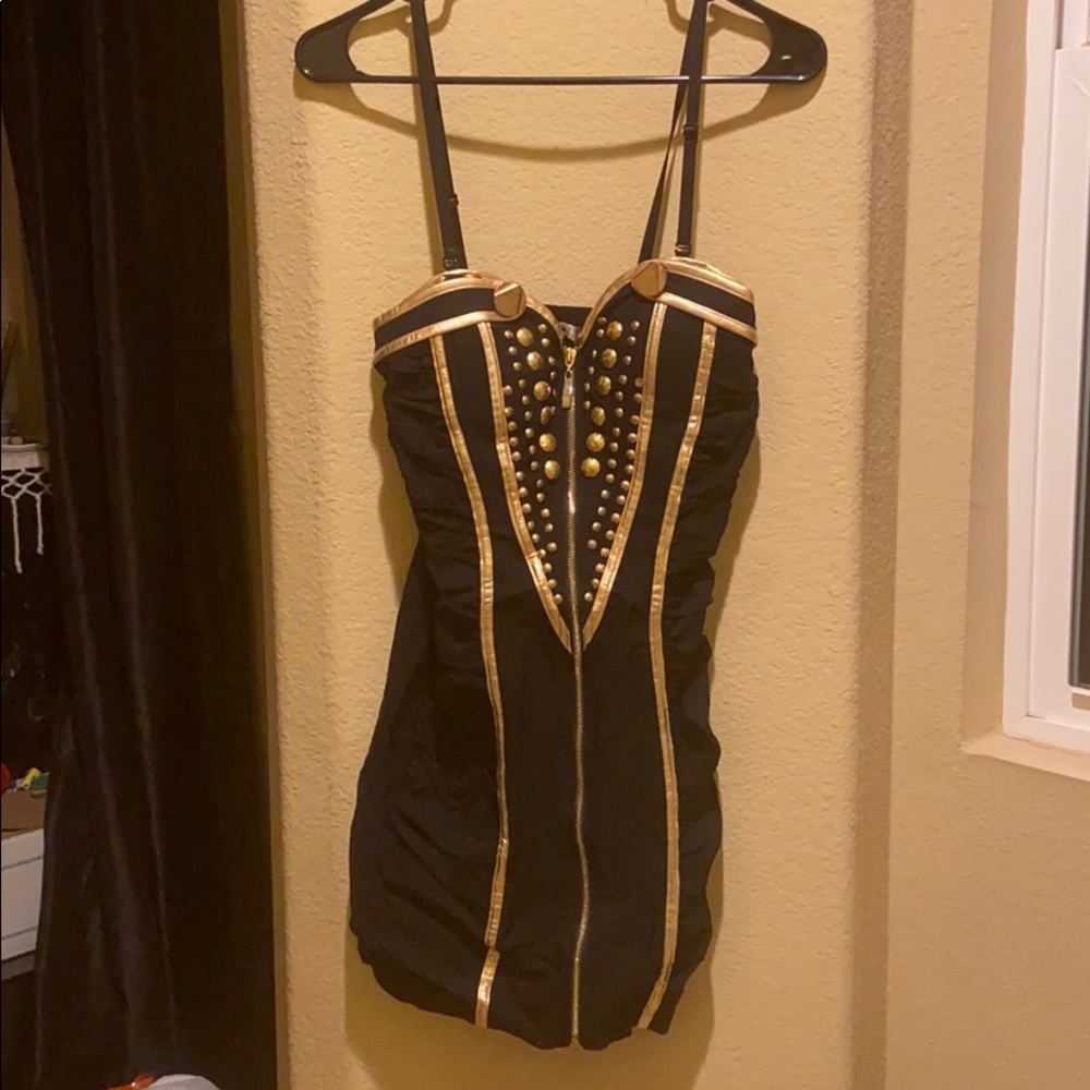 Black cocktail dress with gold embellishment